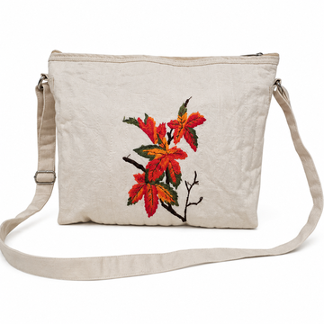 Sac bandoulière en tissu motif feuilles rouges brodé